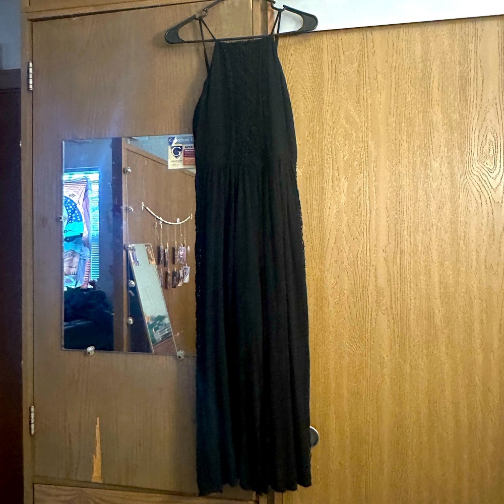 Never worn before. Black romper. Size Medium. American Eagle Outfitters.